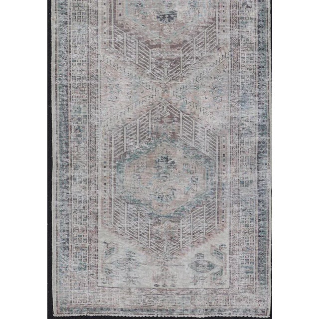 Tribal Vintage Persian Heriz Distressed Rug With Muted Colors & Medallion Design For Sale - Image 3 of 12