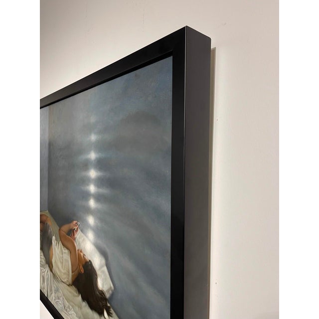 Figurative Desvelada by Aixa Oliveras | Oil on canvas Woman lying on a bed, using a phone in a softly lit room. For Sale - Image 3 of 3