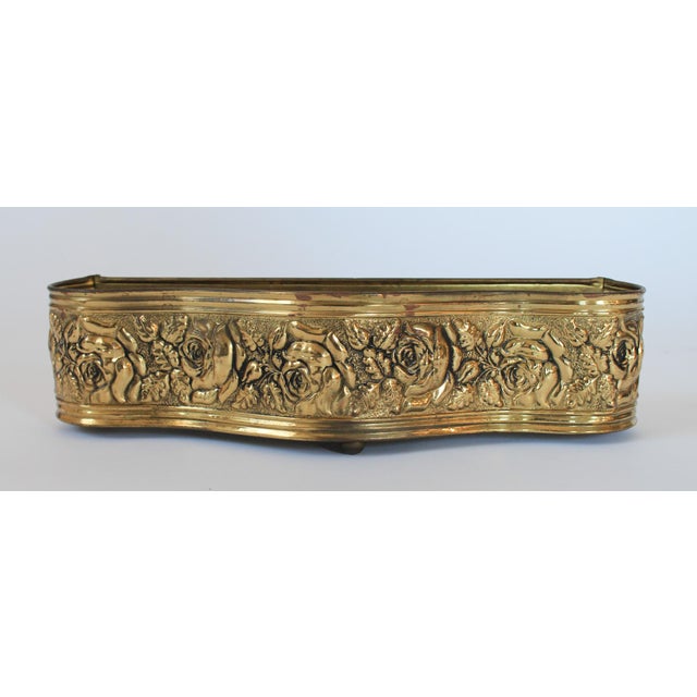 Vintage embossed brass planter with scalloped edge and rose motif. Made in England. Makers mark on the bottom. Some...