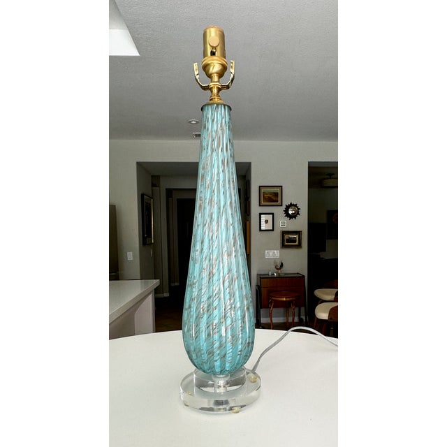 Murano Italian handblown ribbed blue colored glass (robin egg) with copper inclusions table lamp by Alfredo Barbini. The...