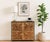 The Chesney Two Doors Wood Accent Cabinet brings warmth and refined storage to any room through its solid wood...