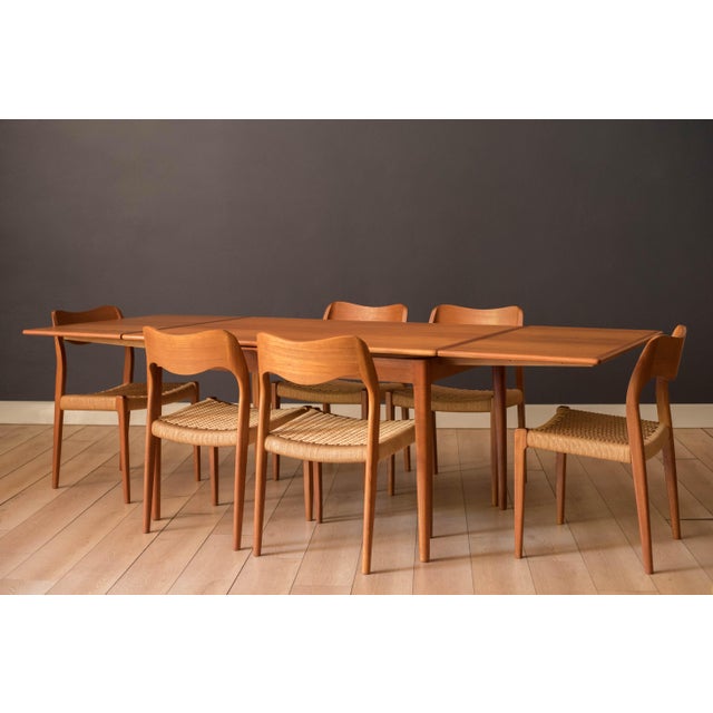 Mid century expandable dining table designed by Niels O. Moller for J.L. Mobelfabrik, Denmark, circa 1960's. This...