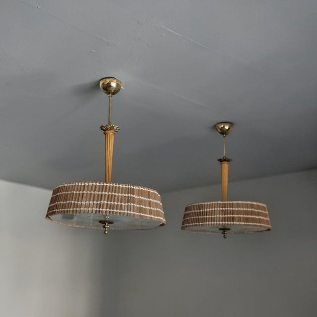 Paavo Tynell / Taito Oy: A rare pair of lamps from the 1940s This lamp, manufactured by Taito Oy, combines the best of...