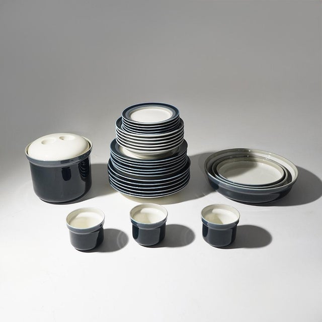 "Eco" dinner service for six, designed by Giovanni Gariboldi for Richard Ginori in the 1970s, is a refined expression of...