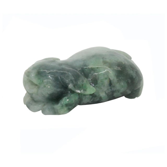 This pig figure pendant is carved from natural untreated jade. Pig is a lucky statue in Chinese culture, sometimes it is...