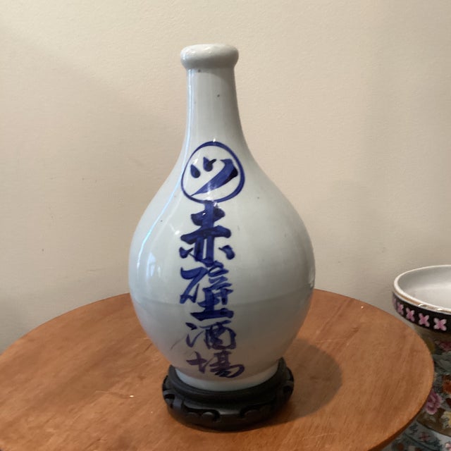 Antique Japanese Tokkuri (Sake Long Neck Bottle) W/ Blue Underglaze Calligraphy on Wood Base For Sale - Image 11 of 12