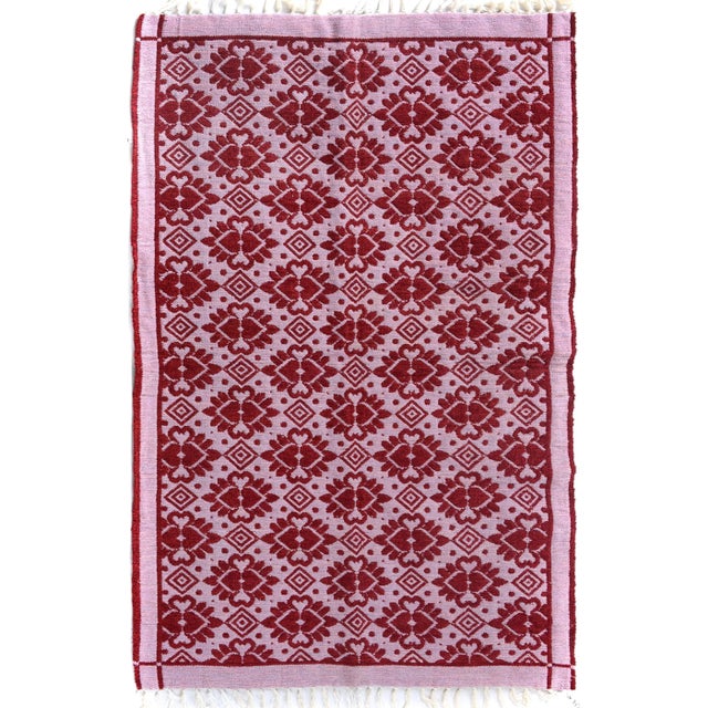 Elegant hand-woven chenille rug with floral motifs in a luminous color palette is a great addition to any décor. Featuring...