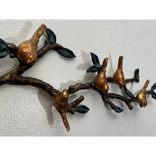 Bring sculptural warmth and organic character to your walls with this vintage cast metal wall sculpture featuring five...