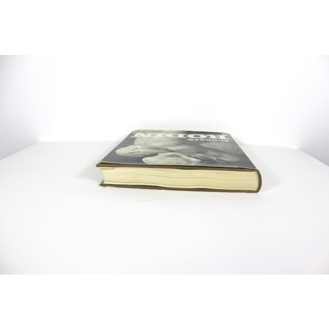 1967 Auguste Rodin Hard cover coffee table book with dust jacket. The book has a beautiful olive green linen cover. It is...