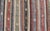Turkish Vintage Kilim Striped Runner With Tribal Motifs in Copper and Greens For Sale In Atlanta - Image 6 of 11