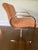 Cool pair of mid century modern Milo Baughman style arm chairs having chrome arms and bases and salmon colored smooth...