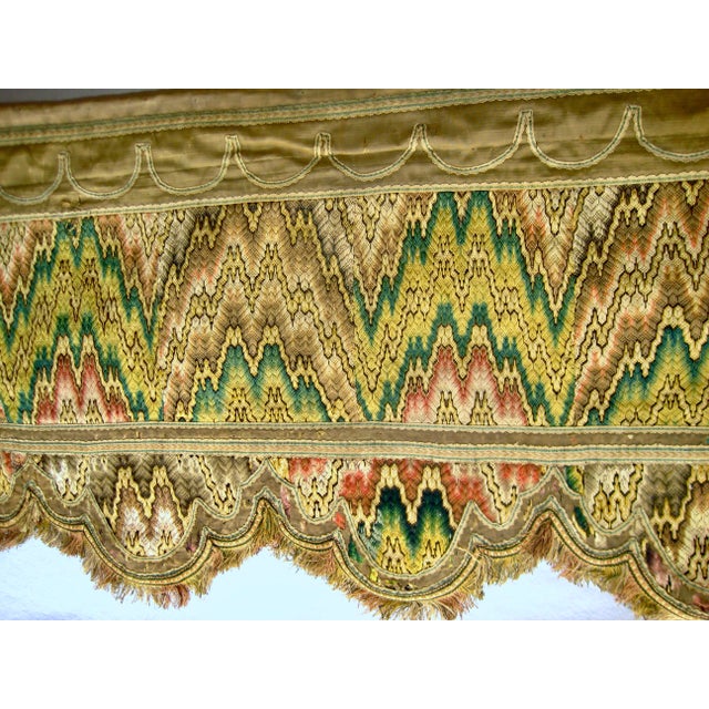 This is the real thing , from the 1700 hundreds this pair of valence are embroidered with what is called the flame stitch...
