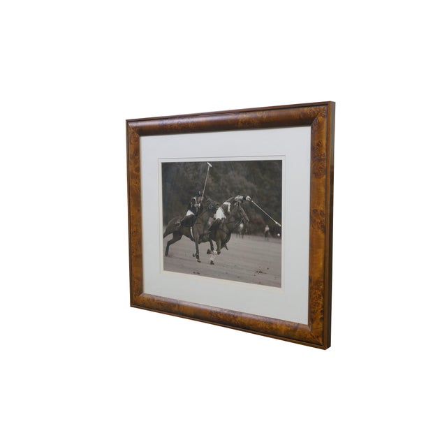 Late 20th century black and white photographic print depicting polo players on horseback, mid game. Sepia photograph...