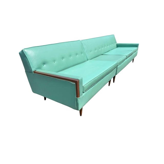 Make a bold statement with this exceptional mid-century modern turquoise and walnut two-piece sectional sofa. Featuring...