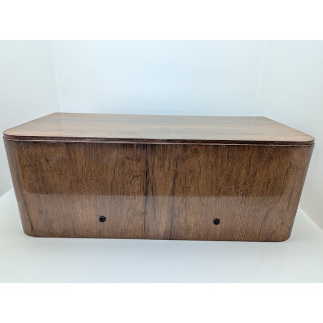 Large storage box with a semi-circular drawer, walnut veneer, hardboard base.