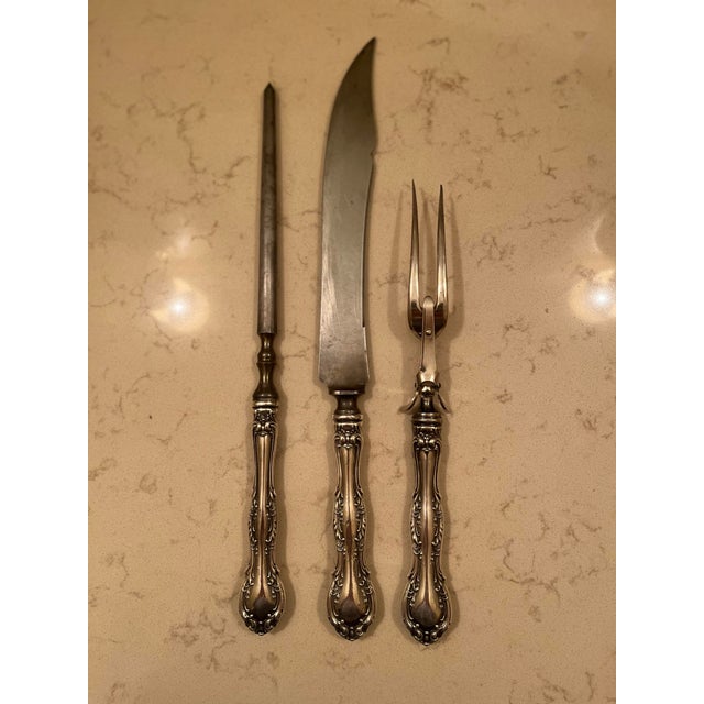 I love the pattern of this sterling silver carving set. It belonged to my grandparents.I don’t know if they were the...