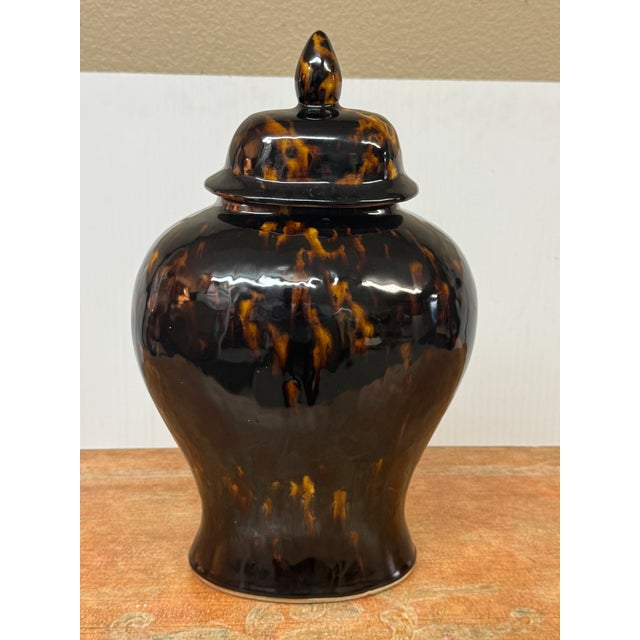 Design Plus Gallery presents a Glazed Ceramic Temple Jar from Martino Interiors. The rounded body has broad shoulders, a...