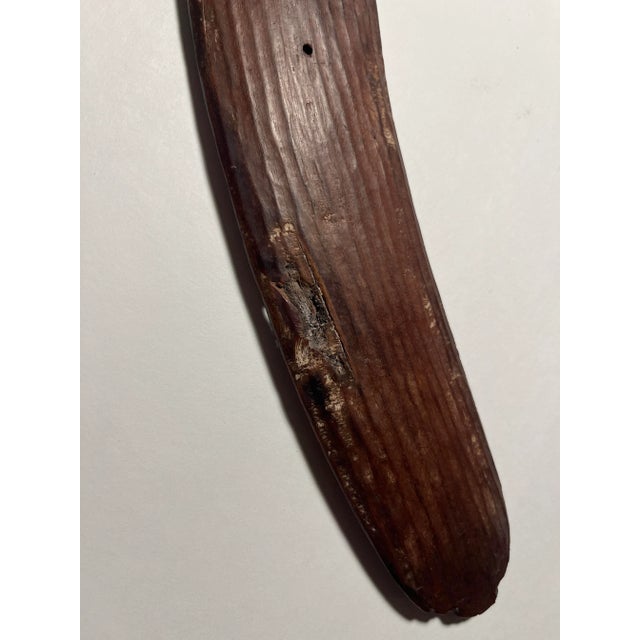 Antique Central Australia Aboriginal Hand Carved Wood Fluted Hunting Boomerang Aprox. dimensions: 27"L x 2.2"W Condition:...