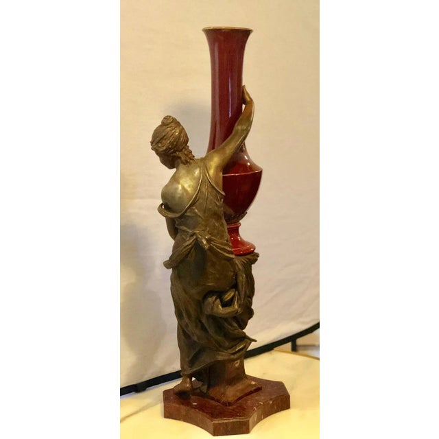 Spelter Figure of a Water Bearer on a Pedestal / Marble With Red Glazed Vase For Sale - Image 4 of 13