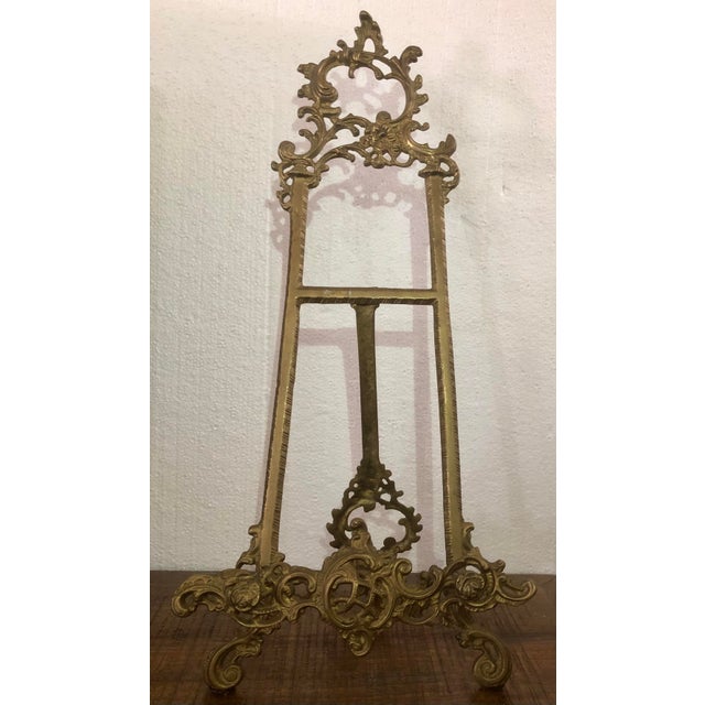 Beautiful vintage solid brass ornate display easel. Perfect for a small painting, picture, or plate/charger. Solid brass....