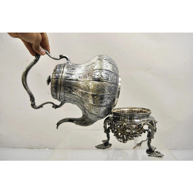 Antique Hunt & Roskell Late Store & Mortimer Silver Plated Tilting Tea Pot Stand. Circa Early 20th Century. Measurements:...