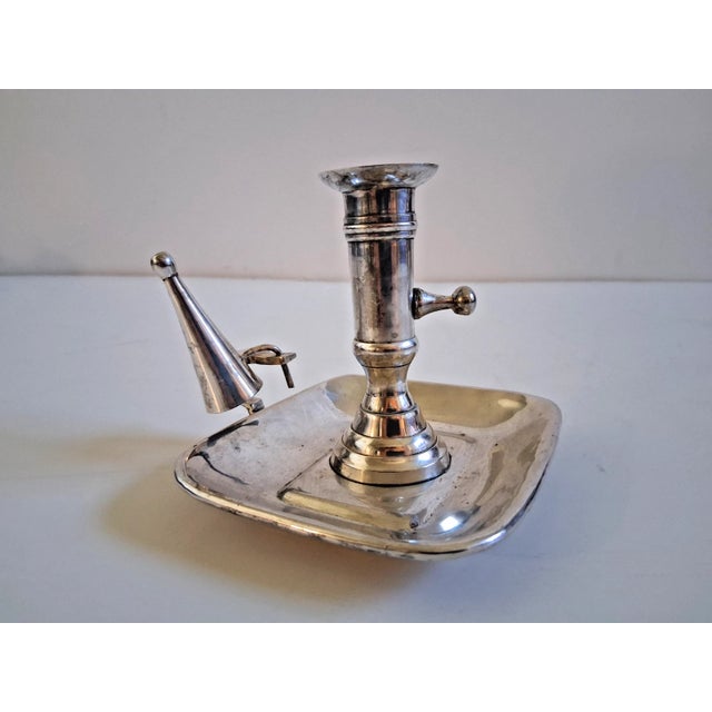 Offered is an antique Silver Plated Chamberstick with Snuffer and an integral drip tray and carrying handle. Stamped...