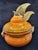The spectacular orange ceramic tureen, specially commissioned by the Eden Rock Hotel in Saint-Tropez, is the epitome of...