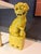 A striking pair of vintage Japanese glazed ceramic Foo Dogs (Shishi) finished in a vibrant chartreuse-yellow glaze....