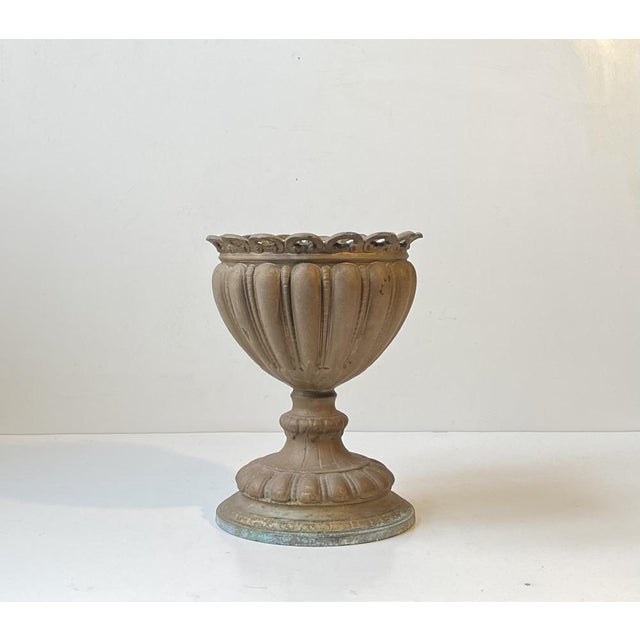 Small unusual garden urn or jardiniere executed in partially painted or cold-patinated bronze. Cast and made in Italy...