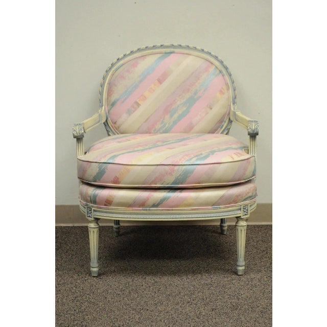 Vintage French Louis XVI Style Pink Blue Carved Bergere Boudoir Lounge Arm Chair. Item features solid carved wood frame,...