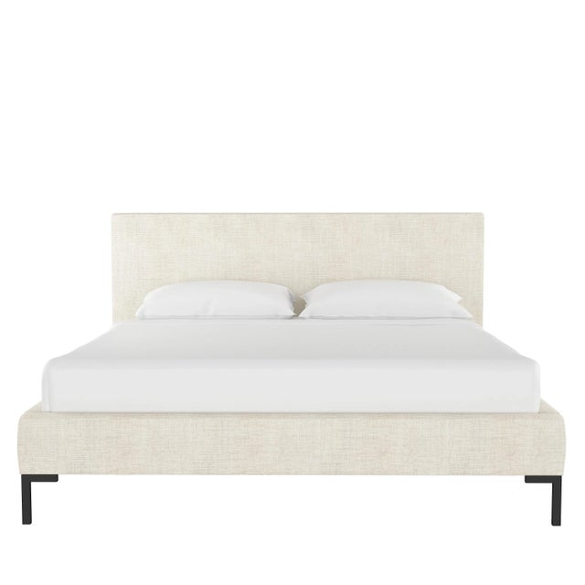 Featured in luxurious fabrics and supported by gorgeous brass Y legs, this platform bed is a force to be reckoned with....