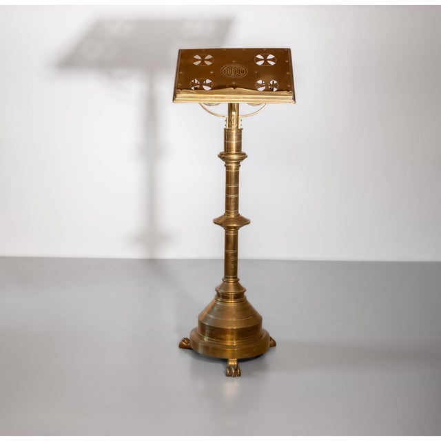 Late Victorian solid brass standing church lectern. English. Circa 1890. The reading slope swivels and is pierced with...