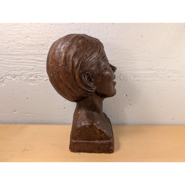 A captivating vintage Mid-Century Modern figurative portrait bust depicting an expressive face captured in a moment of...