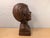 A captivating vintage Mid-Century Modern figurative portrait bust depicting an expressive face captured in a moment of...