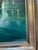 Sourced from the artist's estate in Bucks County, PA. The Flatiron Building rises through a silvery veil of spring rain in...