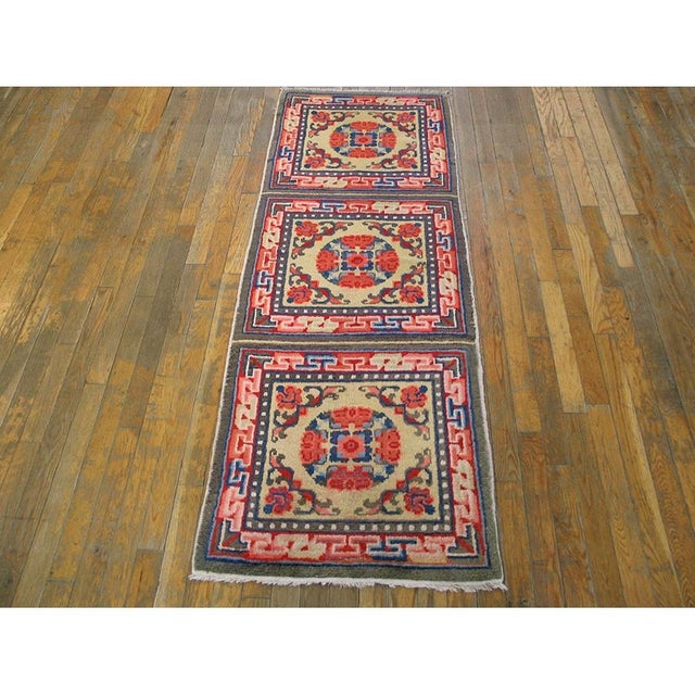 Antique Chinese - Mongolian Small Scatter Size Wool Yellow Rug, Circa Date: 1900s. This exceptional piece from the early...