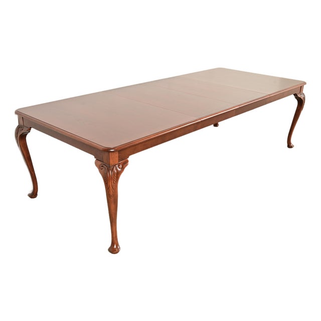 Baker Furniture Queen Anne Carved Cherry and Burl Wood Extension Dining Table, Newly Refinished For Sale