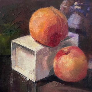 Two Peaches by Yana Beylinson | Oil on Board Still life of two peaches on a white box. For Sale