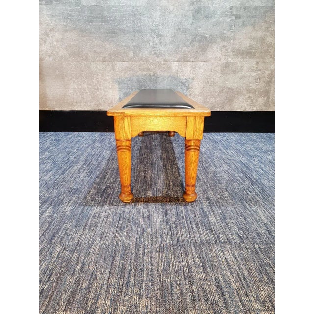 Original waiting bench from Sonnenapothek in Dusseldorf. Wooden inlayed At Deco elements.