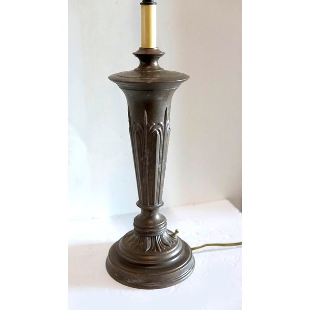 Neoclassical or Renaissance Revival.bronze table lamp from the 1920s or 1930s, is the definition of statement lighting. It...