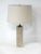 A very well crafted marble based table lamp with linen styled shade , brass double bulbed fixture with chain pull ....