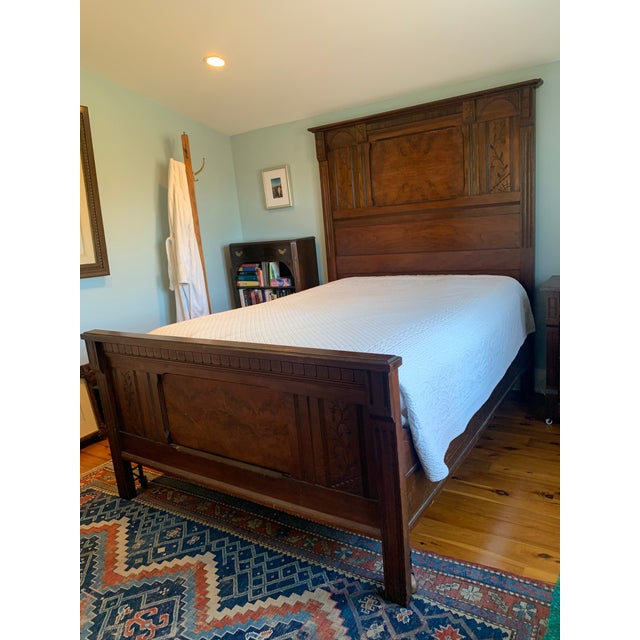 Beautiful late 19th century Victorian Bedframe in the Eastlake style. Mahogany/walnut colored wood with carved detailing....