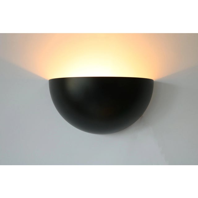 Danish minimalist wall lamp Made by Lyfa 1960s Made in Denmark Black on the outside, creamy white on the inside Width...
