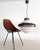Large Italian pendant lamp made of brilliant white glass in a wave-like shape. The glass is solid and has no opening at...
