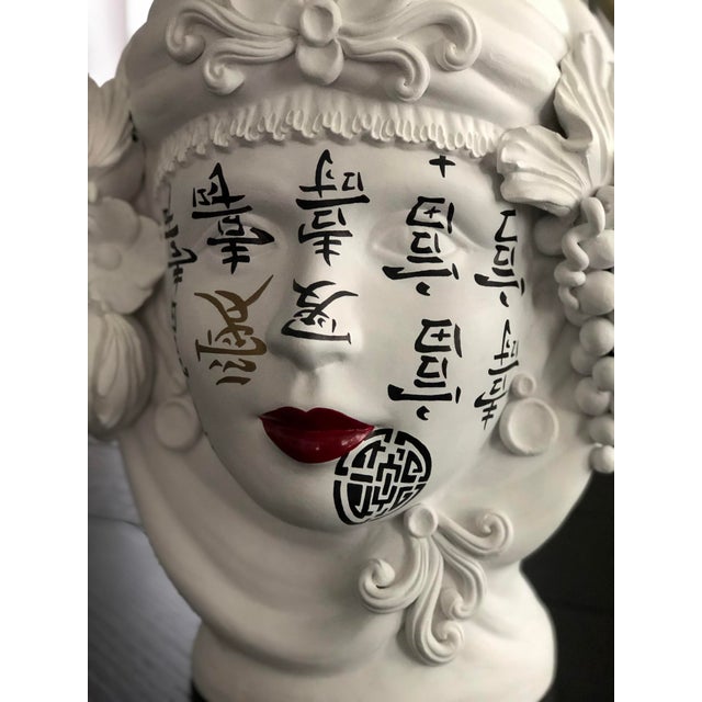 Incredible hand painted contemporary ceramic vase by artist Stefanie Boemhi. Features hand written text and details. This...