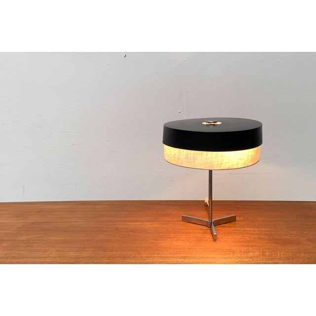 Mid-Century Minimalist Tripod Table Lamp, 1960s, in Very Good conditions. Designed 1960 to 1969 European Plug (up to...