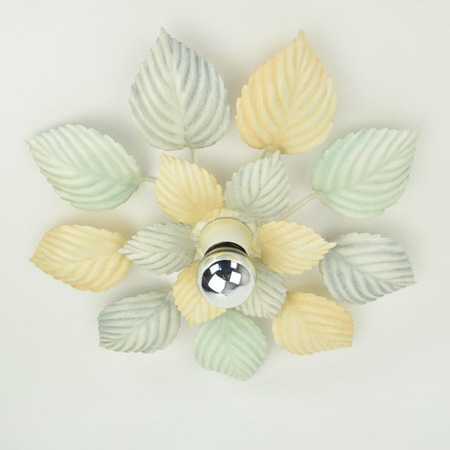Beautiful vintage pastel colored flush mount with metal leafs. Made by Eglo Germany around the 1980s/90s. The lamp is in...