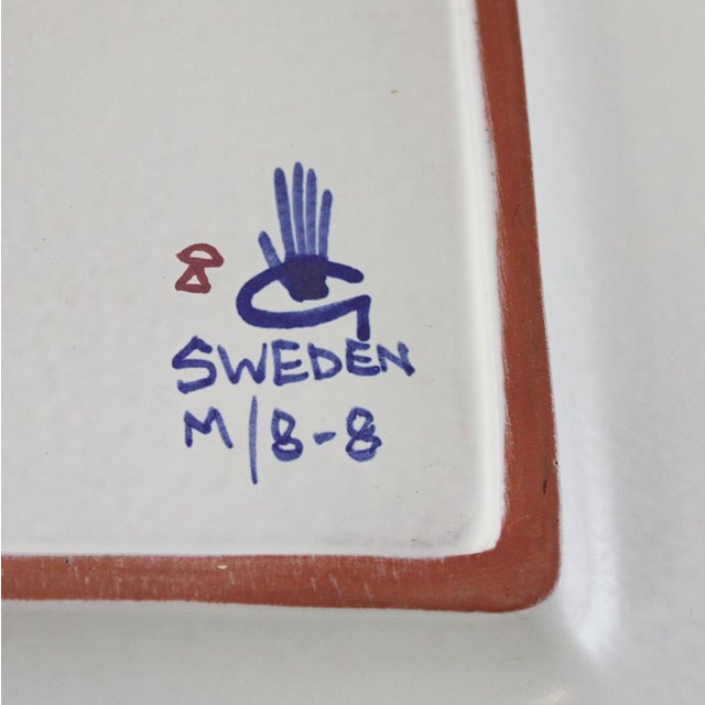 Rare mirror from Gustavsberg - designed by Stig Lindberg. Made at Gustavsbergs Studio. Hand decorated. This piece has an...