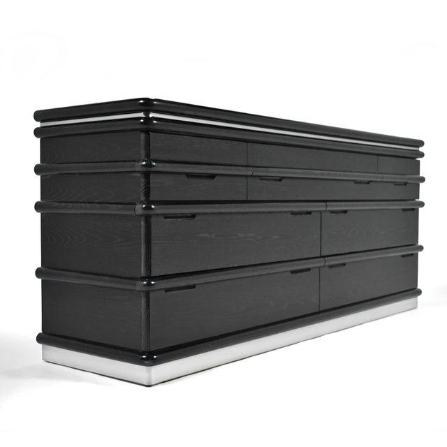 Designed by Jay Spectre for Century, this dramatic 7-drawer dresser from his "Eclipse" collection is a post-modern take on...