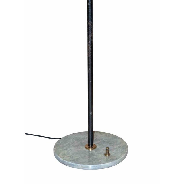 Red vintage Lamp is an original design lamp realized in the 1970s A beautiful vintage lamp with a marble round base and a...